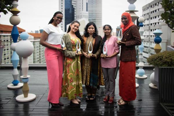 2024 OWSD-ELSEVIER Award Winners Women scientists holding awards