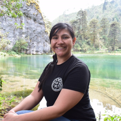 EC Fellow Maura Quezada Aguilar, Guatemala: identifying at-risk oak species Woman scientist beside a lake