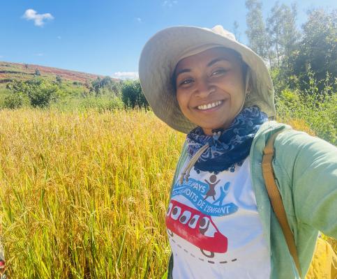 EC Fellow Mbolatantely Fahazavana Rakotondramanana,Madagascar, works alongside farmers to develop biofortified rice Woman in a field in sunlight
