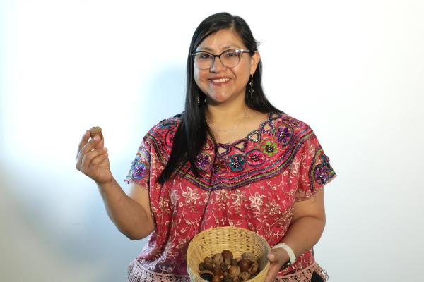 Woman scientist holding a seed