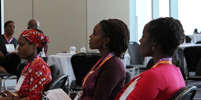 Black women sit in a classroom