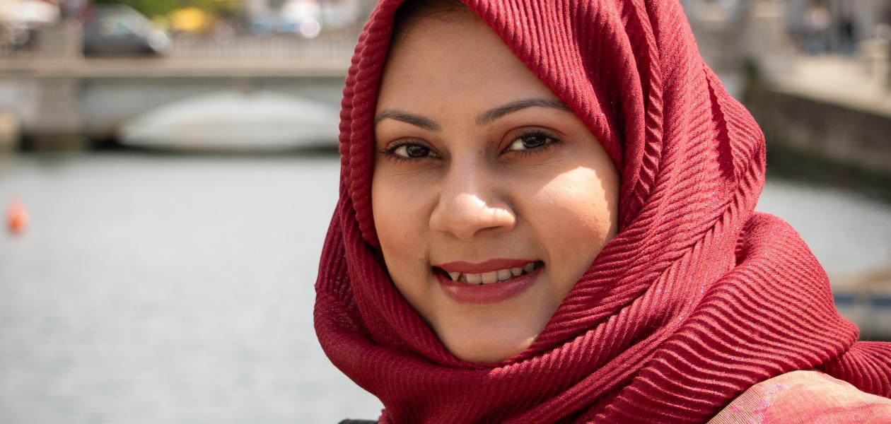 Woman smiling wearing headscarf
